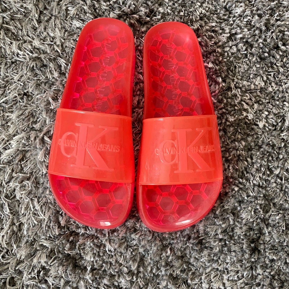 Woman’s Calvin Klein jelly slides
